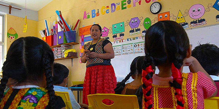 Women and children wearing indigenous clothing